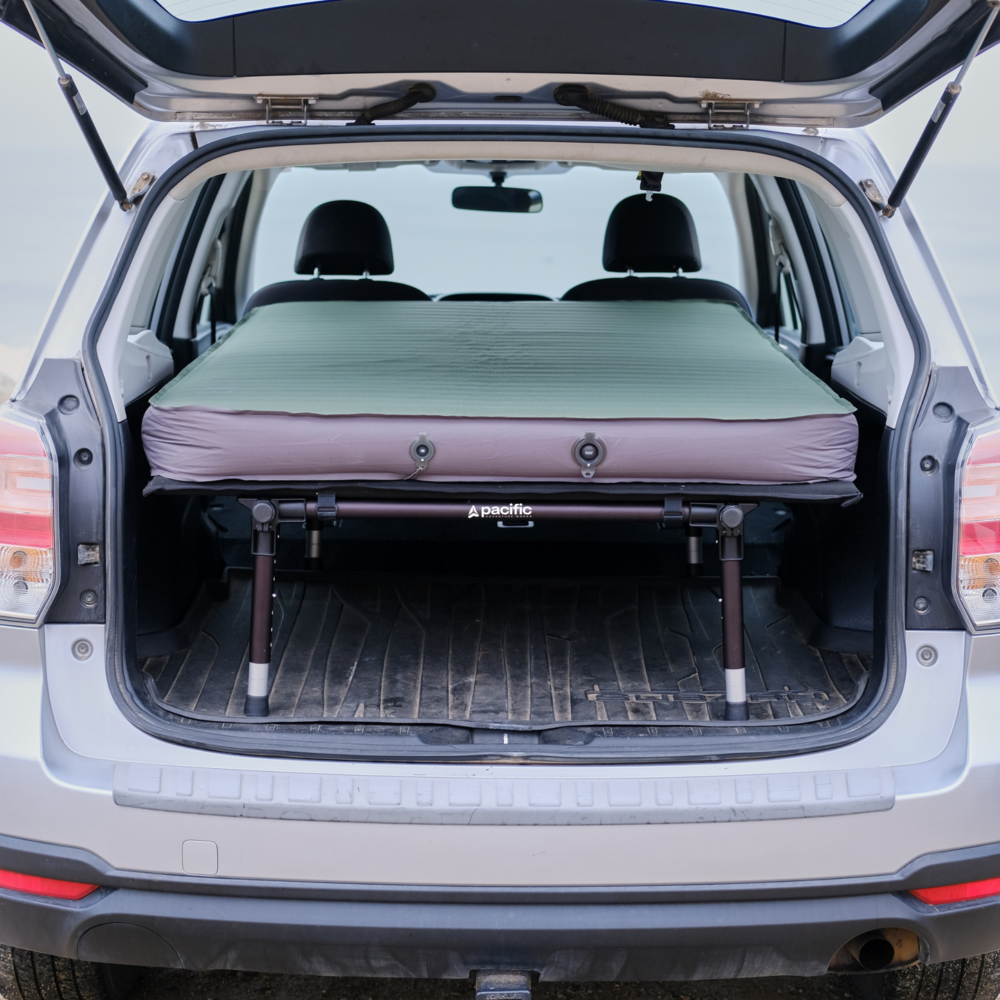 hideaway sleeping platform installed in subaru trunk