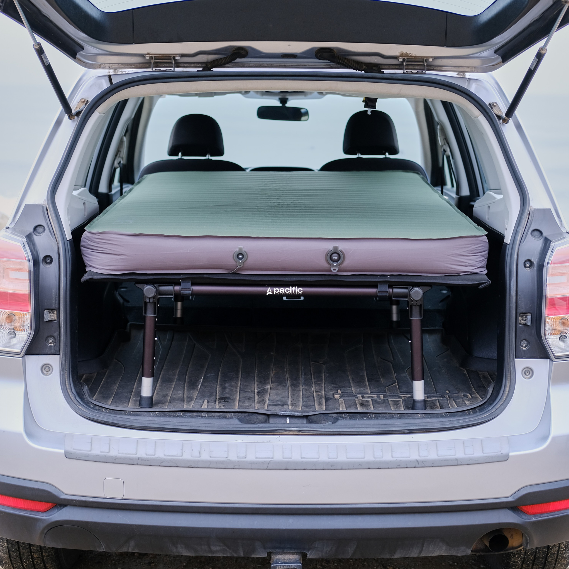 hideaway sleeping platform installed in subaru trunk